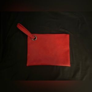Red faux leather envelope clutch with wrist strap